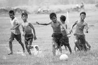 They ___ playing football when it started raining. a) is b) are c) were